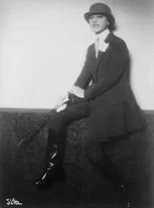 Madame Dora Prints: Doggy. Mrs Mortimer Davis, as she appeared at the Paris races last week. 3 August