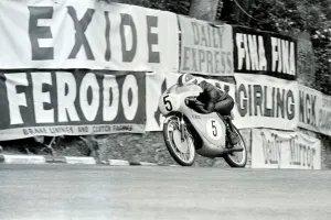 Motorsport TT Race Prints: Douglas, Isle Of Man: Japans 1. Morishita pictured in action on his 50 c. c. Suzuki