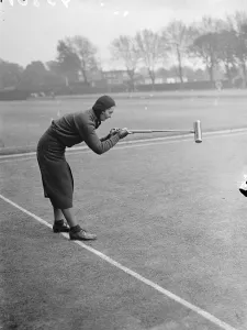 Dressed for the weather, at Roehampton croquet. Women competitors dressed for the weather