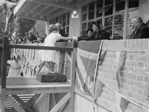 The Duchess of Kent receiving purses from children. 1938