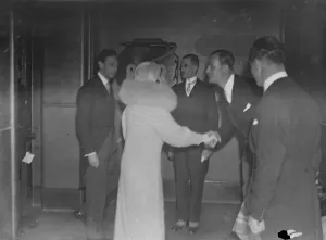 Fur Collar Prints: The Duke and Duchess of York arrive for a lecture by C W A Scott, the winner of