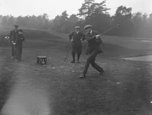 Golf Prints: Duke of Leeds driving. In the background is seen Lt Colonel Browning. In golf match