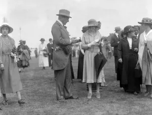 Umbrella Prints: Earl of Lonsdale and Miss Audrey James at Glorious Goodwood Racecourse, West Sussex