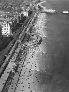 Aerial View Prints: Eastbourne Beach, Sussex, photographed from the air while thousands of holidaymakers
