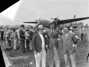 Empire Air Day at Biggin Hill, Kent. Three gentlemen pose in front of a Bristol