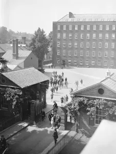 Factory Prints: Employees Leaving the works of Messrs Heathcoat and Co at Tiverton. 15 July 1929