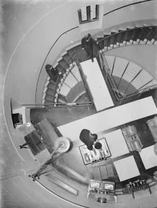 Stairs Prints: The engine room of the Dungeness lighthouse in Kent, viewed from above. Part of
