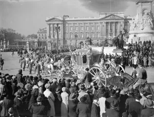Enormous early morning crowds watch Coronation procession rehearsal. Enormous crowds