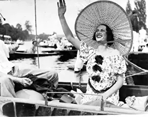Bon Voyage Prints: Enormous hat fashion the largest seen on the river worn by a spectator who cheered