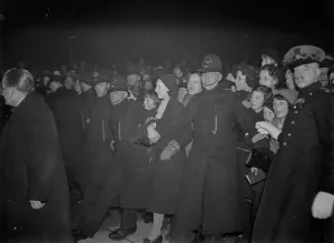 Cinema Prints: Enthusiastic crowds being held back by police and cinema ushers at the opening of