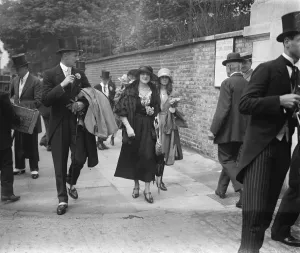 Eton versus Harrow match at Lords. Hon Mrs George Cooper and her daughter arriving