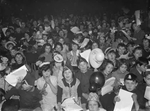 An excited crowd of children at the Swanscombe childrens party. 31 January 1936