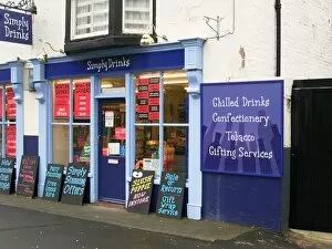 Sign Collection: Eye-catching off-licence called Simply Drinks with blackboards and posters advertising