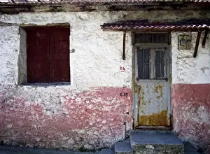Blue Prints: Facade of dilapidated old house in Turkish village credit: Marie-Louise Avery /