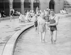 Bathing Wear Prints: At Finchley Open Air Baths Frank Mose ( Arsenal Football Cub ) with his wife