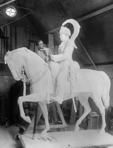 A fine equestrian statue of the late King of Nepal. Mr D A Tonelli at work in
