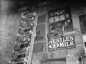 The fire brigade dealing with a fire at a Foots Cray shop in Kent. A ladder up
