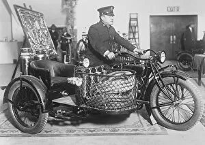 Fireman Collection: Fire fighting motor cycle A motor cycle equipped with fire fighting apparatus suitable