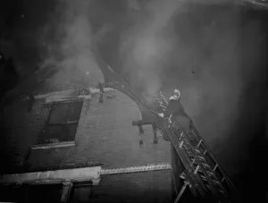 The Firebrigade dealing with a house fire at, Caerthillian, Station Road, Sidcup