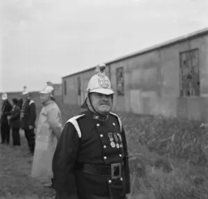 Fireman Collection: Firemen at the fire brigade display in Dartford, Kent. 1936