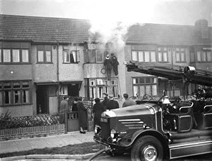 Fireman Collection: Firemen tend to a fire at Alma house on Old Farm Avenue in Sidcup, Kent