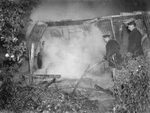 Smoke Prints: Firemen tend to a fire at the Bull in Chislehurst, Kent. 1939