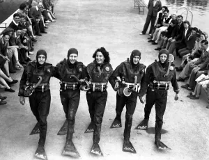 Group Prints: The first frog - woman. Frogmen the underwater swimmers used for daring