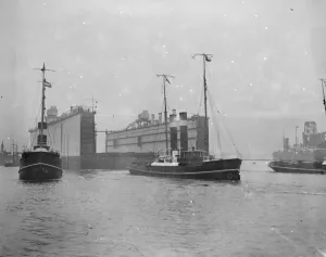The first half of the new floating dock for Singapore leaving the Tyne On the right