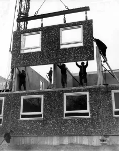 The first train loads of walls, floors, stairs and landings components for the London