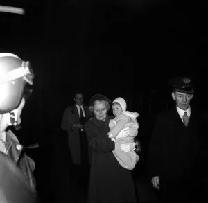 Royal Prints: First train trip since Christmas In the arms of his nurse Viscount Linley son