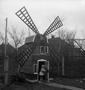 Child Collection: Five-year-old Denise Holmes and her sister Nicola, two, now have a windmill at