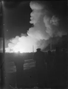 Flames and smoke coming from a fire at the tannery in Dartford, Kent. The silhouetted
