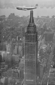 Flying Cloud Passes By. Passing the dirigible mooring mast 1, 250 feet above street