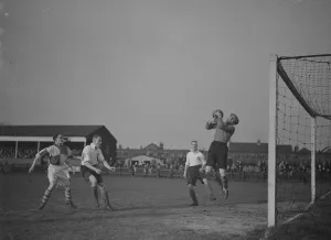 Ball Prints: Football match; Erith and Belvedere versus Maidenhead. The goalie makes a save