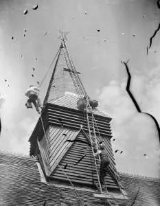 Footscray Church steeple being re - shingled. 1939