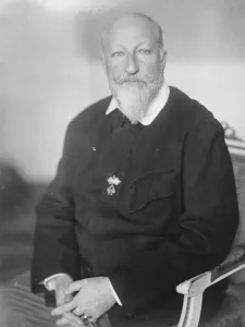 Foxy Ferdinand, ex ruler of Bulgaria, wearing a novel garment designed by himself