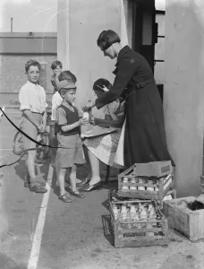 Bottles Prints: Free milk for children on holiday in Crayford, Kent. 1939