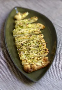 Snack Prints: Freshly baked cheese straws made with grated courgette and grated emmental strewn