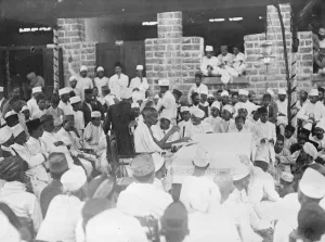 Gandhi addresses university students in Poona, India. Mr Gandhi delivering