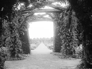 Gardens Prints: The gardens at the Kings country house, Sandringham, Norfolk. The view through