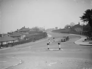 Houses Prints: The general view of a road crossing in Erith, Kent. 1938