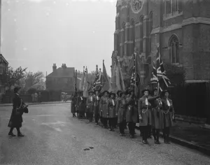 Girl guides during their church parade in front of the Parish Church of St John