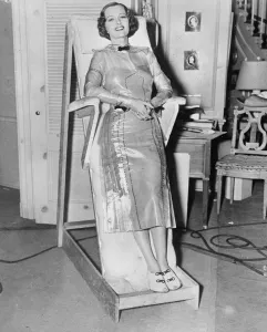 Glass gown is latest fashion, but you can t sit down. Glaziers, instead of tailors