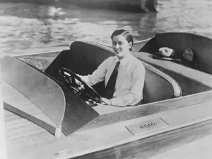 Gloria Swanson speed boating in flamingo harbour, Miami beach, Florida. 13 February