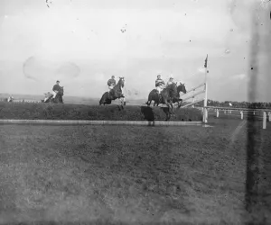 The Grand National Race at Liverpool Taking the water jump 19 March 1921