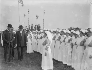 Ireland Prints: On the Grass of Drumbeg Sir Edward Carson Inspecting the Red Cross Nurses