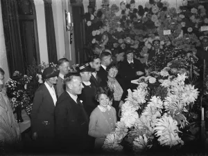 Plants Prints: Group at the Petts Wood flower show, showing the Secretary with her hand up. 1937