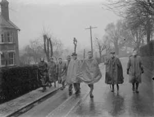 Roads Prints: A group of young hikers stroll through the rain. 1937