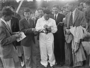 Celebrity Prints: H L Hadley signing autographs after winning the Imperial Trophy at Crystal Palace Racing