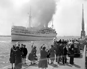 Bon Voyage Prints: Handerchiefs flutter as relatives wave goodbye to men the 1st Battalion The Black Watch